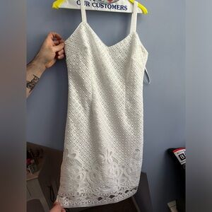 Romantic white cocktail dress.